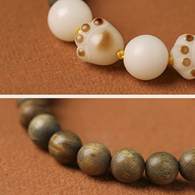 Alternate Angle Close Up of Carved Cat Paw Bodhi Seed Bead Bracelet