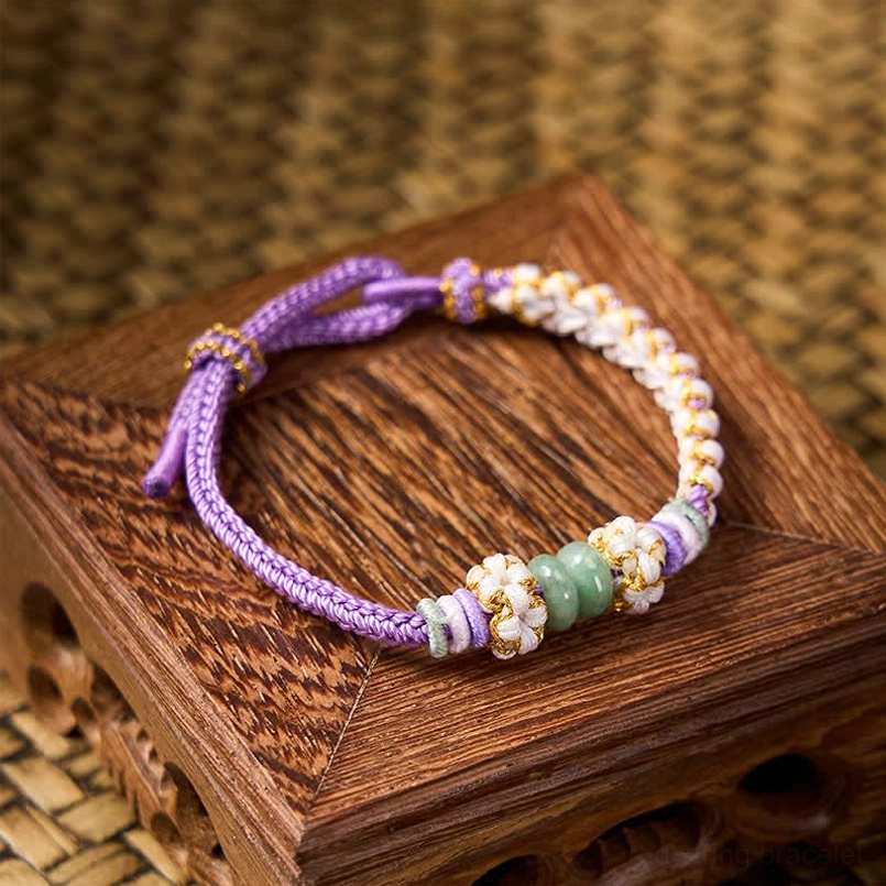 Green Chinese knot luck bracelet with adjustable cord and jade beads