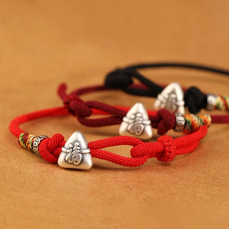 Hand braided fu zongzi red string bracelet full detail side view