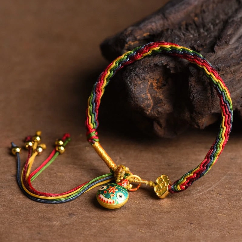 Hand woven reincarnation knot detail of Tibetan lucky bracelet