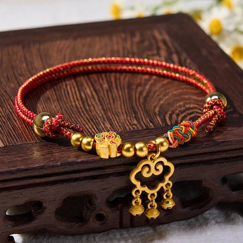 Handcrafted lucky pet collar with red string and prosperity charm, sacred symbolism