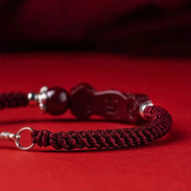Handcrafted red string bracelet with Pixiu charm and prosperity energy