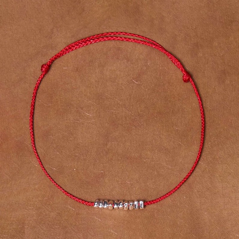 Artisan handmade red string protection bracelet with sterling silver details