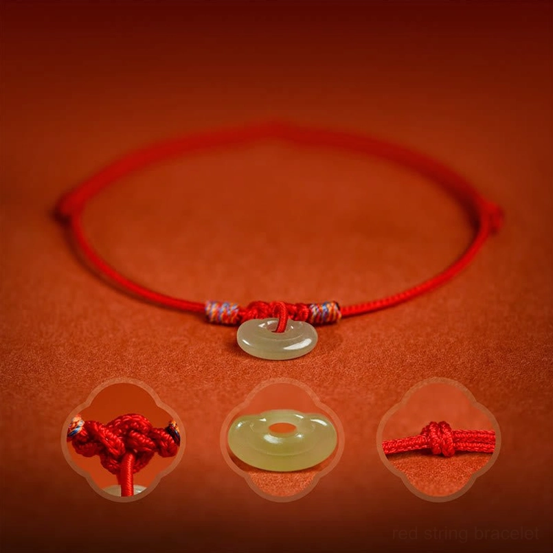 Handcrafted red string jade pet collar detail shot showing knot work and pendant