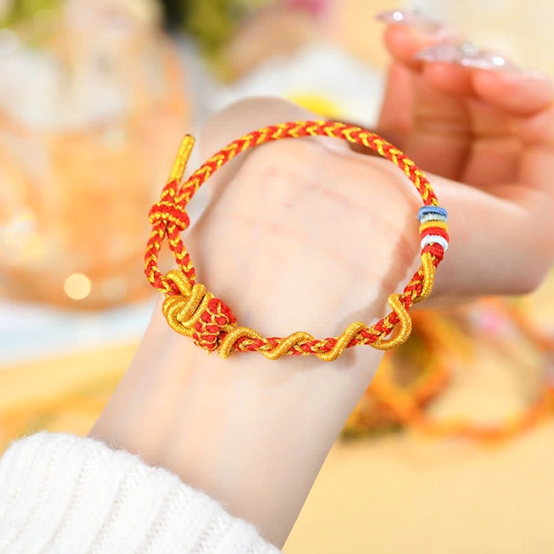Handcrafted Year of the Snake bracelet with mixed braided cord and bead embellishments