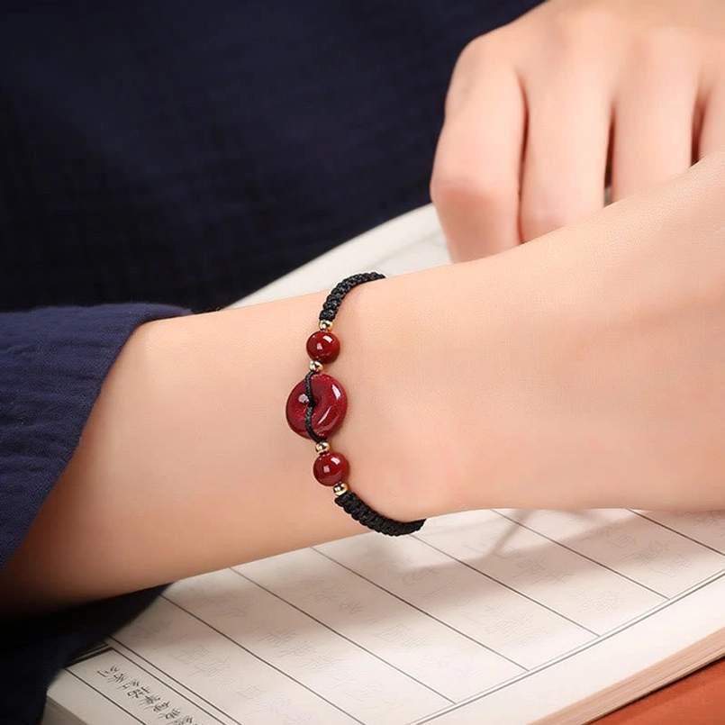 Handmade natural cinnabar bracelet with adjustable sliding knot design