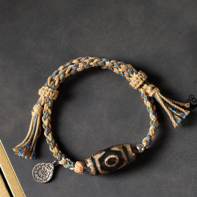 Handmade Dzi Bead braided rope bracelet with patterned stone bead