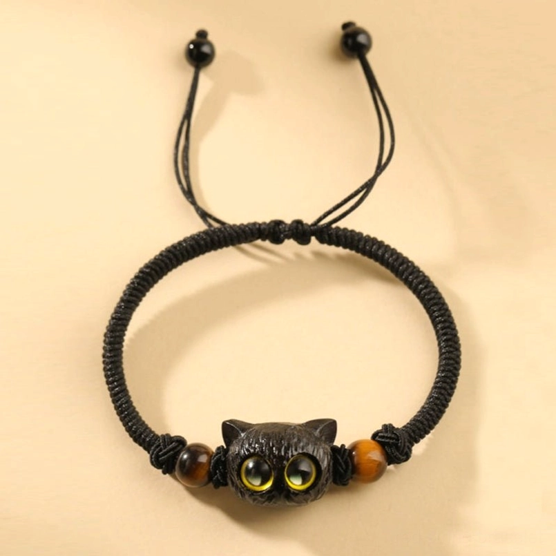 Handmade ebony cat red string bracelet spiritual talisman product shot
