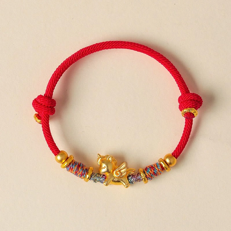 Handcrafted lucky red string horse charm bracelet product shot