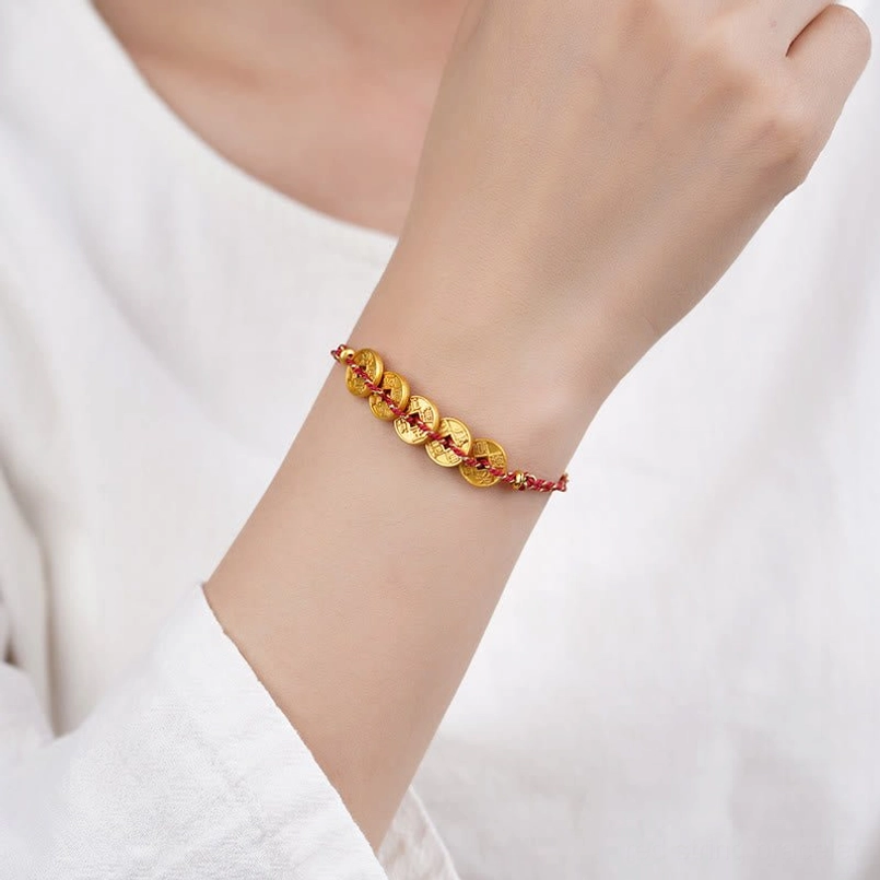 Handmade Five-Emperor Coins red string bracelet showcasing ancient coin craftsmanship