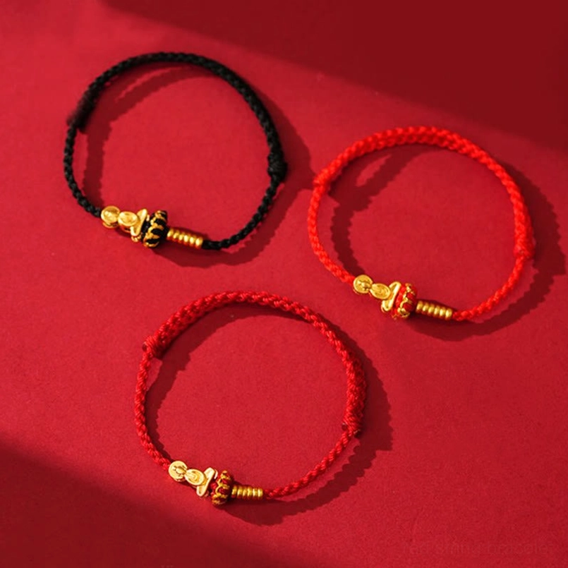 Adjustable red string prayer bracelet with Formless Buddha charm and handcrafted braided design