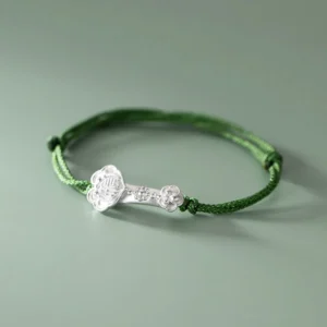Handmade green string bracelet with 999 sterling silver fu character ruyi charm