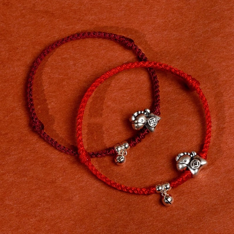 Handmade red string Year of the Horse bracelet with silver horse coin charm artisan craft