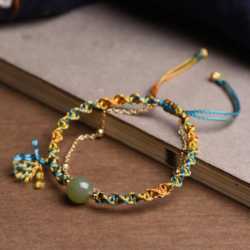 Artisan-made double-layer jade lucky bracelet with tassel and adjustable fit