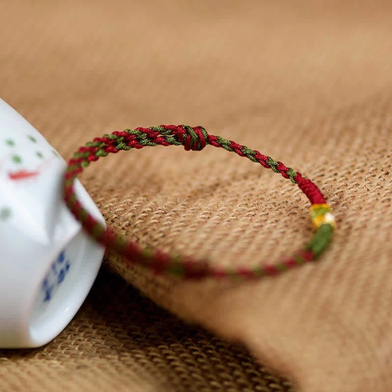 Handmade red green braided koi fish luck bracelet with gold ornament