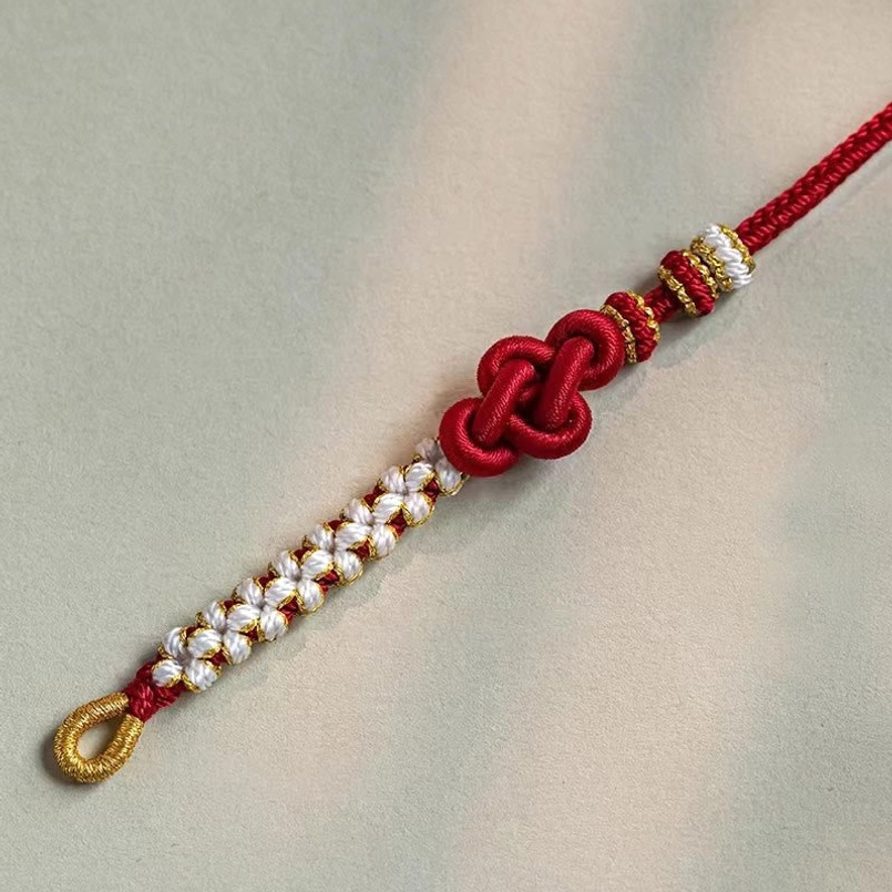 Handmade red luck rope bracelet with adjustable fit for various wrist sizes 5.5 to 7.5 inches