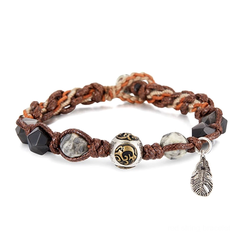 detailed woven texture view of handmade red string obsidian bracelet