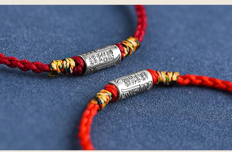 Red woven lucky bracelet with sterling silver charm authentic handmade piece