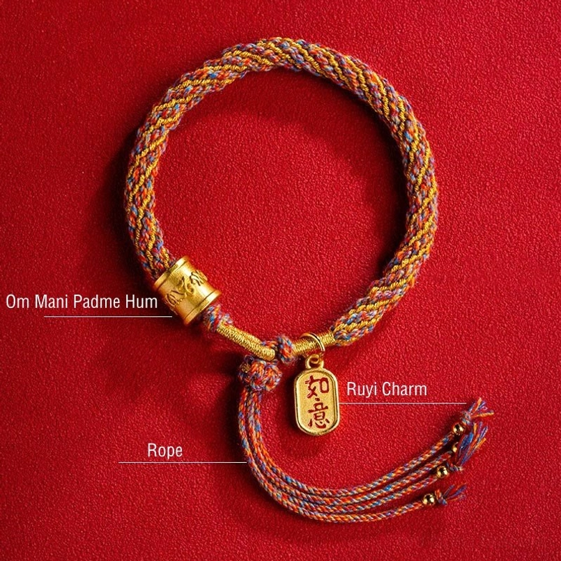 Handmade Tibetan braided bracelet with sacred mantra charm and auspicious Ruyi symbol detail shot