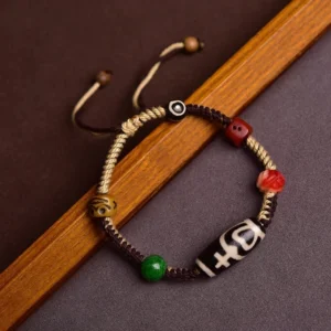 Handmade Tibetan Dzi Bead Red String Bracelet Three Quarter Side View