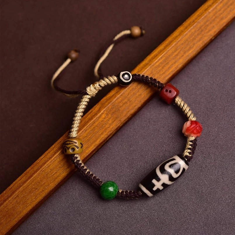Handmade Tibetan Dzi Bead Red String Bracelet Three Quarter Side View