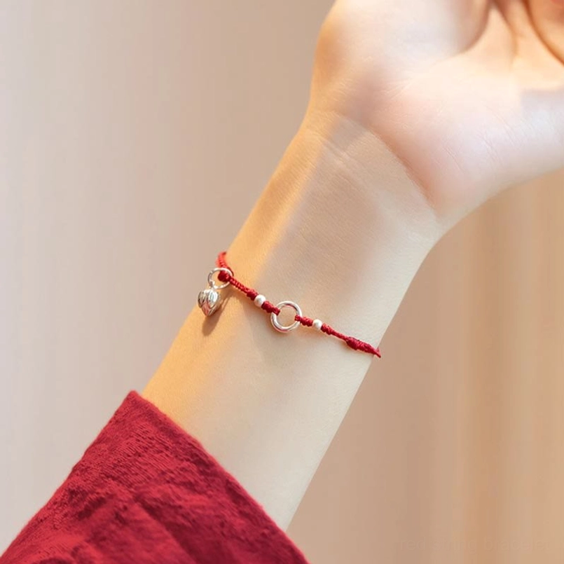 handmade woven red cord bracelet sterling silver peace symbol charm