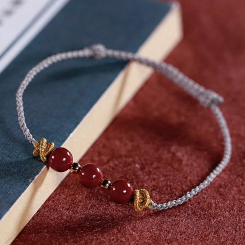 Cinnabar bracelet adjustable knot detail close up view