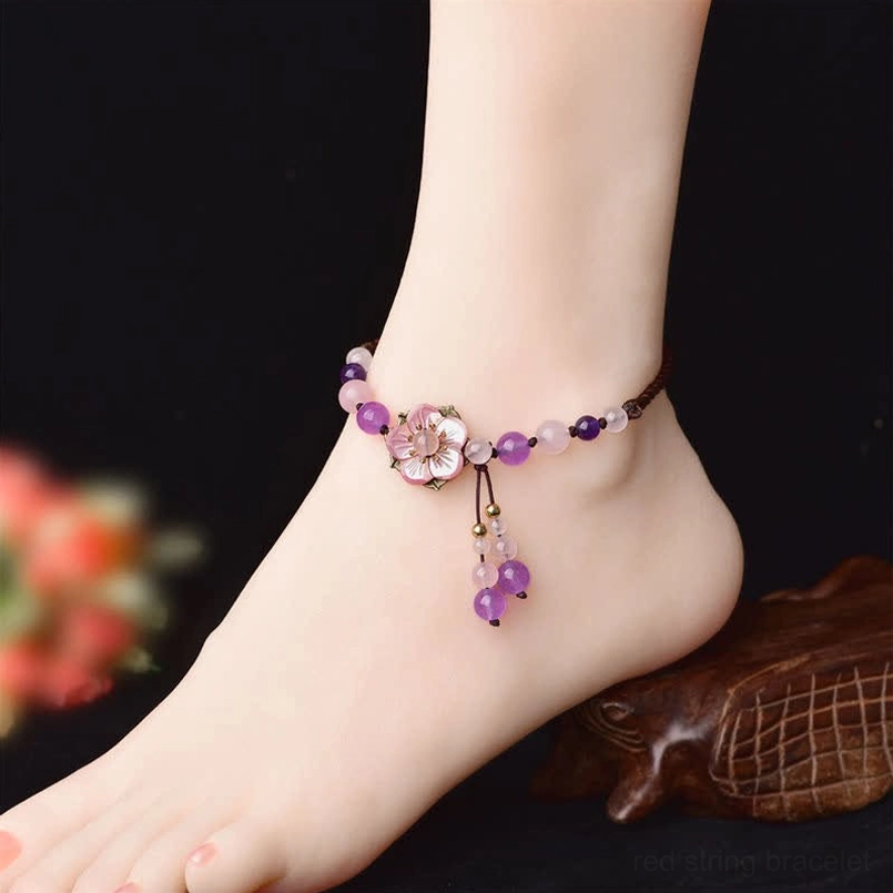 Amethyst rose quartz ankle bracelet worn on human ankle showing comfortable fit and healing crystal design