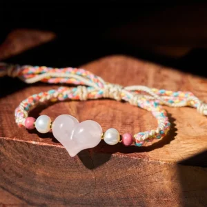 Heart Shaped Pink Crystal Braided Red String Bracelet Side Overhead View