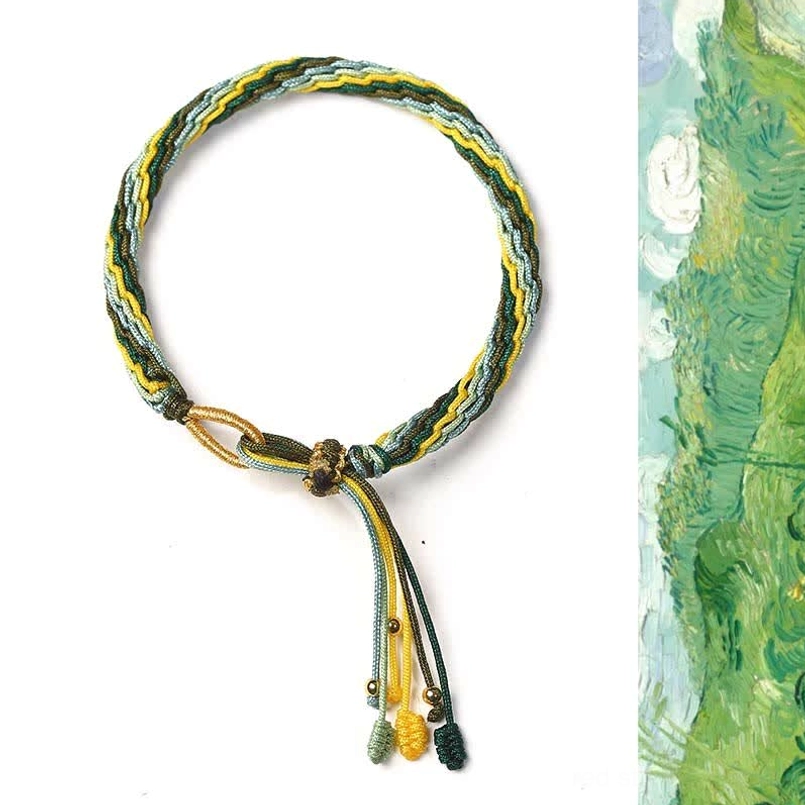 Green and yellow hetian jade red string bracelet showing colorful weave with protective spiritual properties