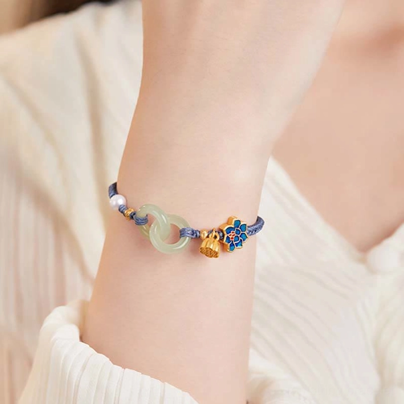 Hetian jade bracelet product showcase with peace buckle and lotus charm details