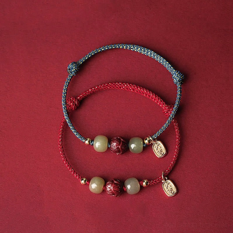 Red and blue braided rope bracelets with jade cinnabar beads and gold tags - color variants display