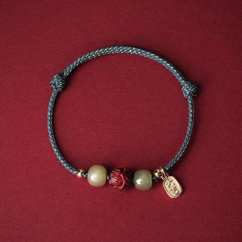 Blue braided rope Hetian jade cinnabar lotus bracelet - calm and clarity design