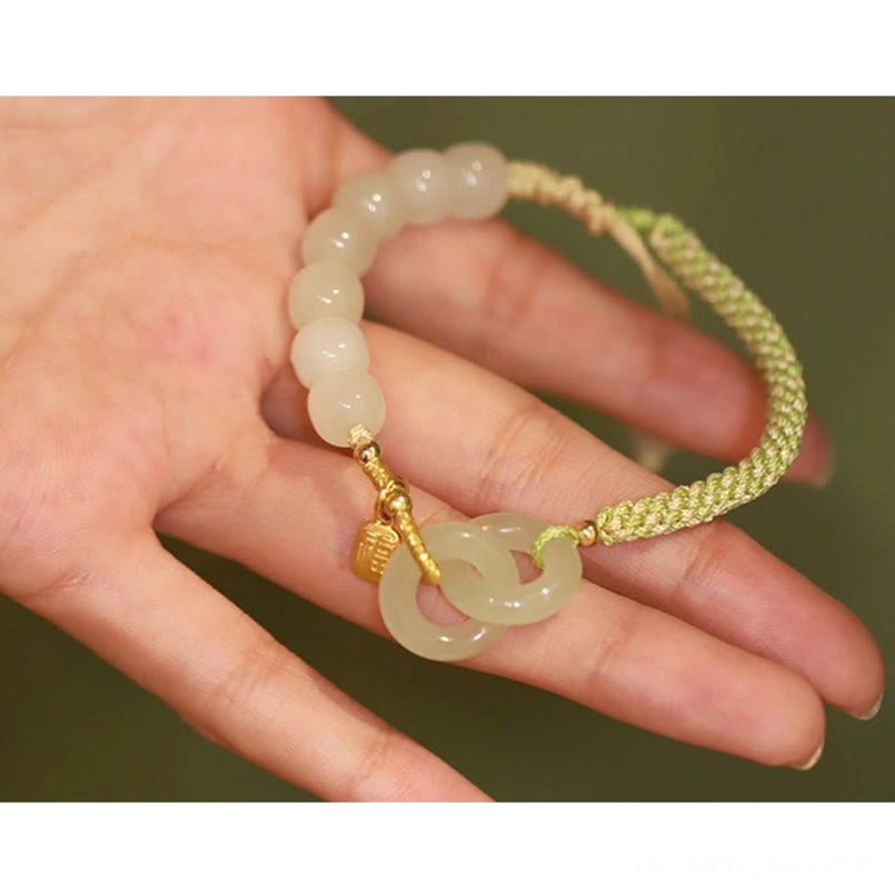 Hetian jade abundance bracelet with double peace buckle design showing craftsmanship and jade quality