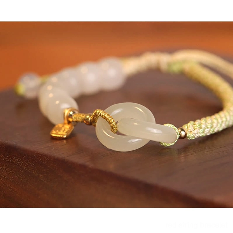 Hetian jade double peace buckle fu character bracelet flat lay product photography with size reference