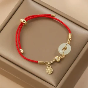 18K gold plated Hetian jade peace buckle red string bracelet with Fu character charm on beige gift box