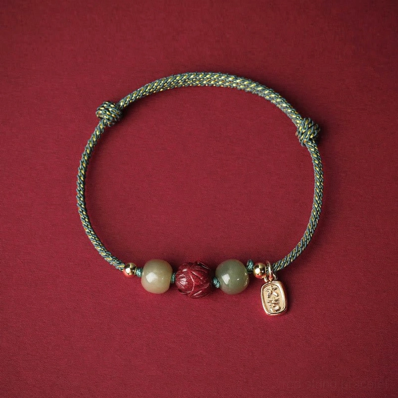 Cyan braided rope Hetian jade cinnabar lotus bracelet - balance and healing energy
