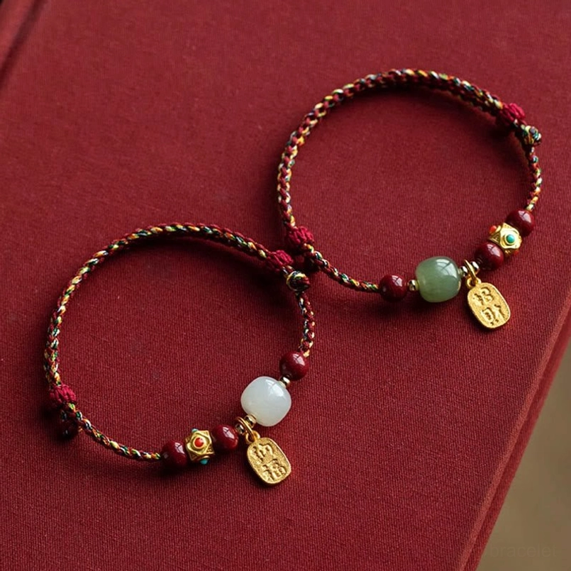 Lucky fortune charm bracelet hetian jade with multi-colored red string complete product shot