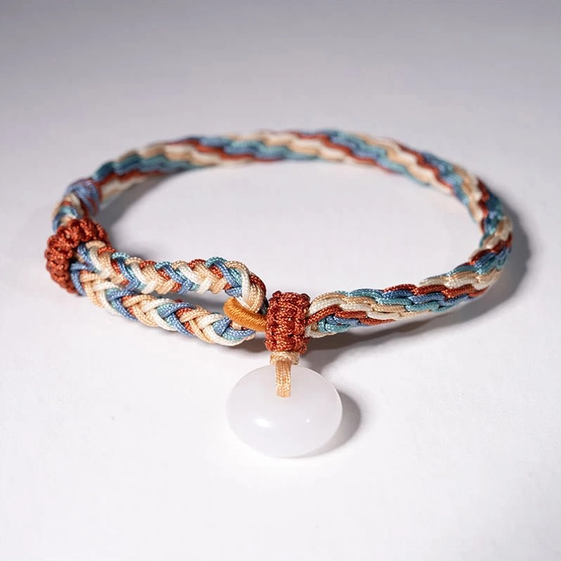 Full View of Hetian Jade Peace Buckle Braided Bracelet on Light Gray Background