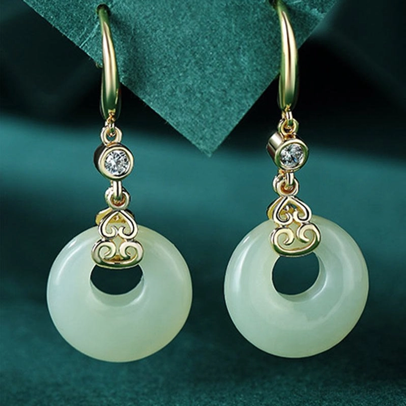 Matching hetian jade peace buckle earrings with sterling silver hooks and zircon accents