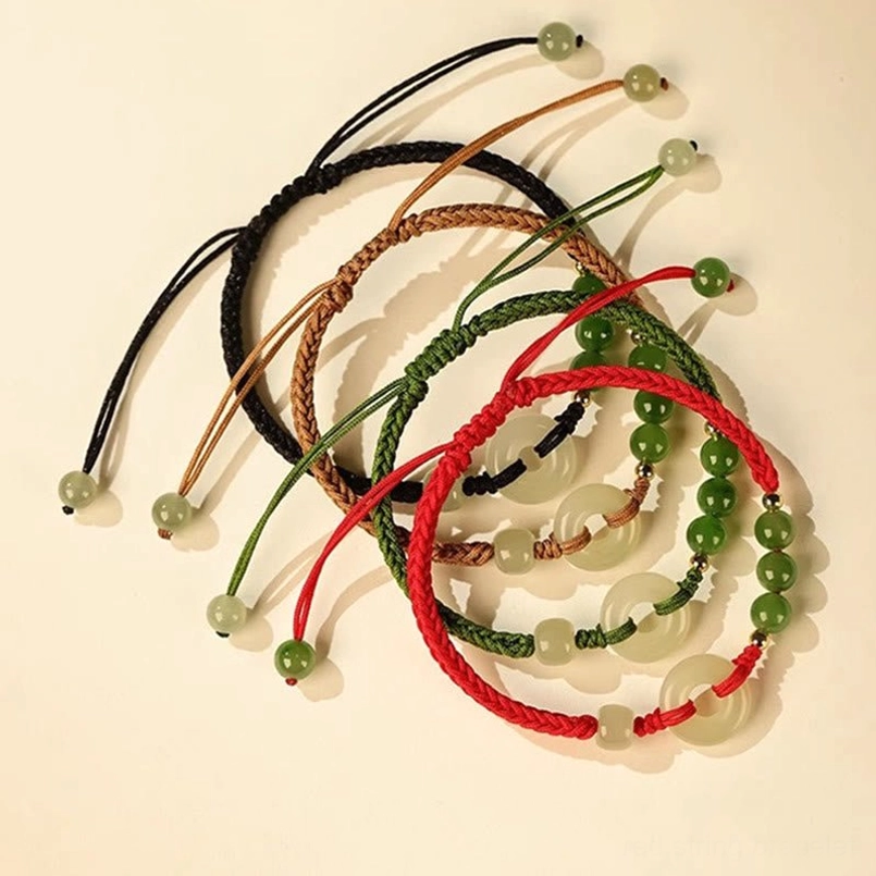 Hetian Jade Peace Buckle Red String Bracelet Detail Shot Showing Smooth Polished Surface