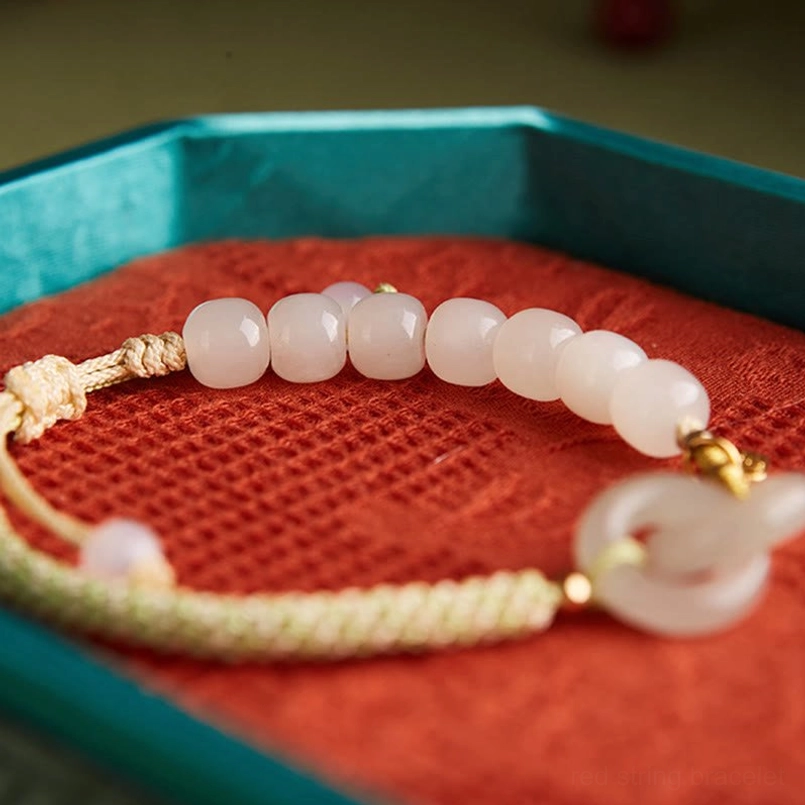 Hetian jade peace buckle bracelet with 925 sterling silver gold-plated hardware and green braided cord