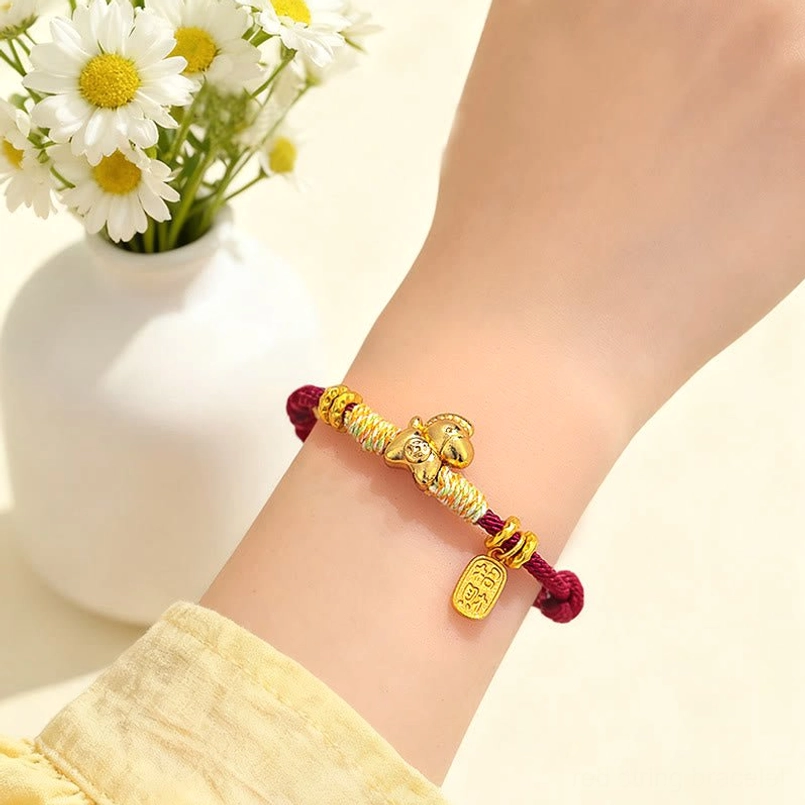Zodiac horse lucky charm bracelet close up of engraved fortune symbol