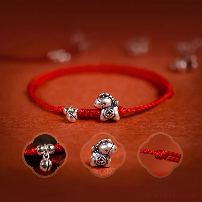 Year of the Horse silver charm bracelet with detail insets showing bell and horse charm design