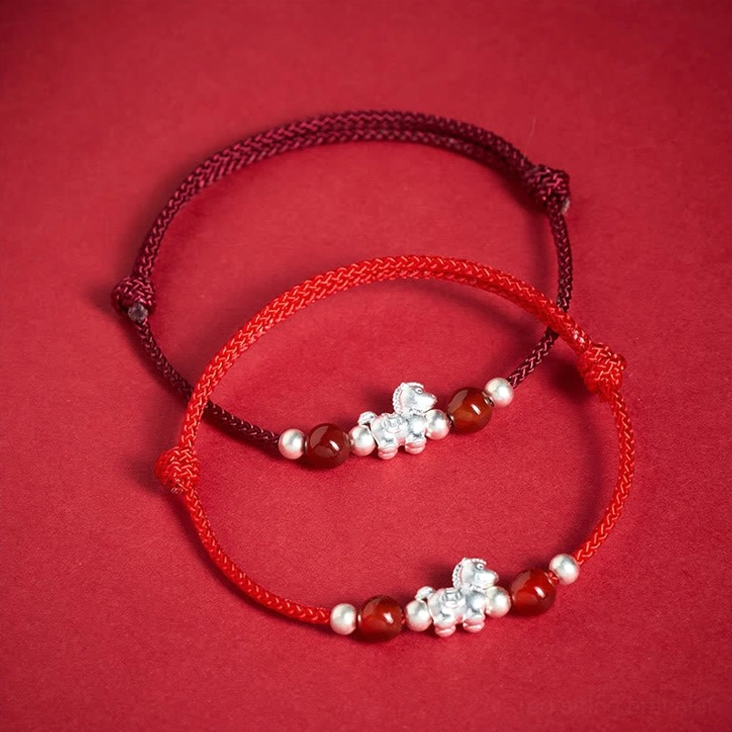 Black rope horse red agate bracelet with silver horse and beads front display