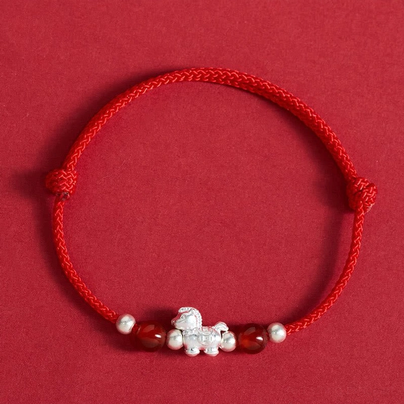 Red rope horse red agate bracelet with silver horse charm and beads front view