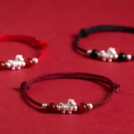 999 sterling silver horse red agate string bracelet three color rope options with silver horse charm flat lay