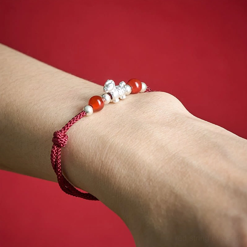 Wine red rope horse red agate bracelet on wrist with silver horse and red agate beads