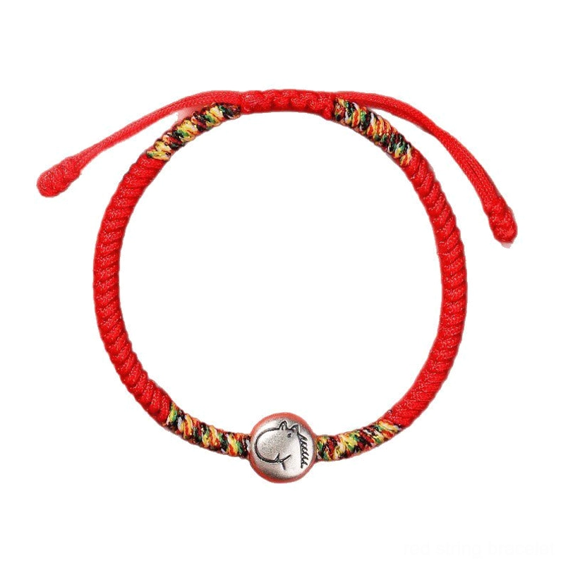 Zodiac Horse red string bracelet laid flat showing full length adjustable design