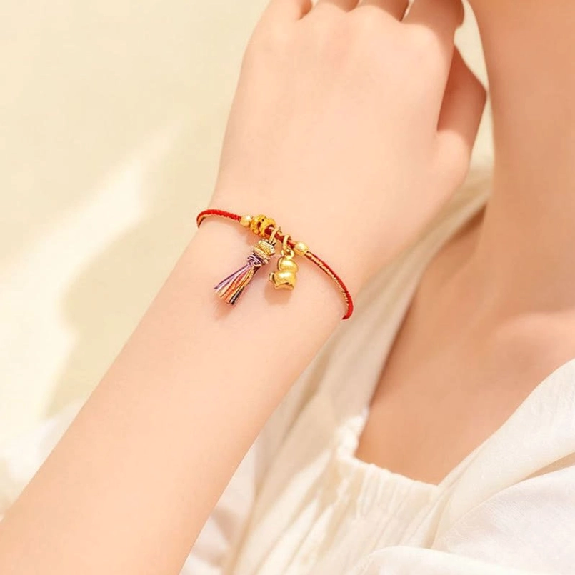 Year of the Horse red string bracelet with gold engraved tag